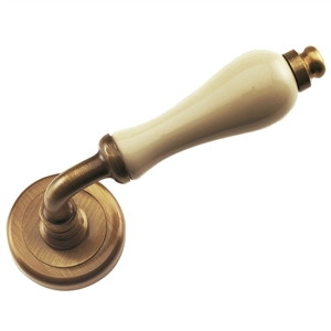 door handle 2 door handles set on round rosette satin bronze cream finish manufactured in brass and porcelain mavalen